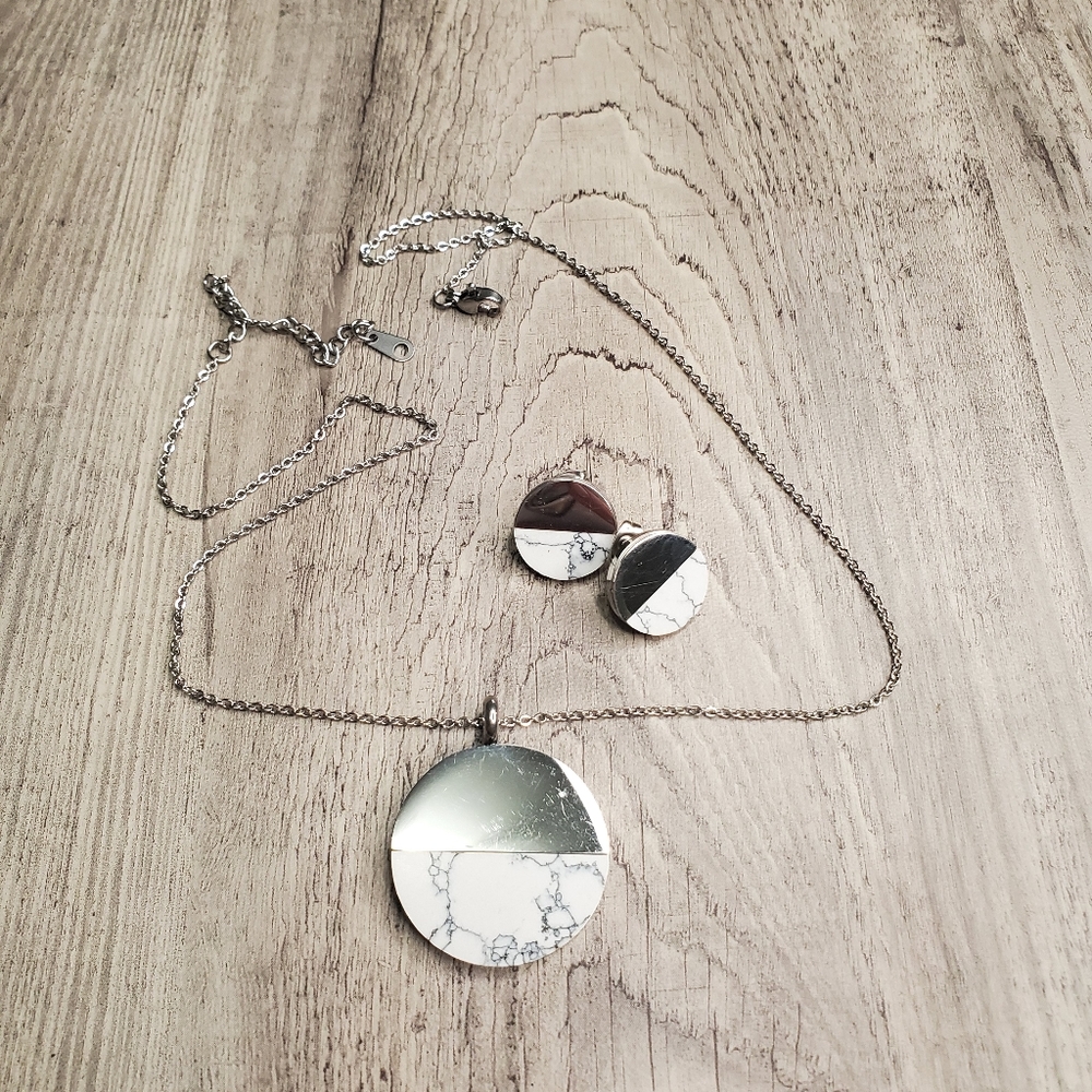 Stainless steel set with white stone